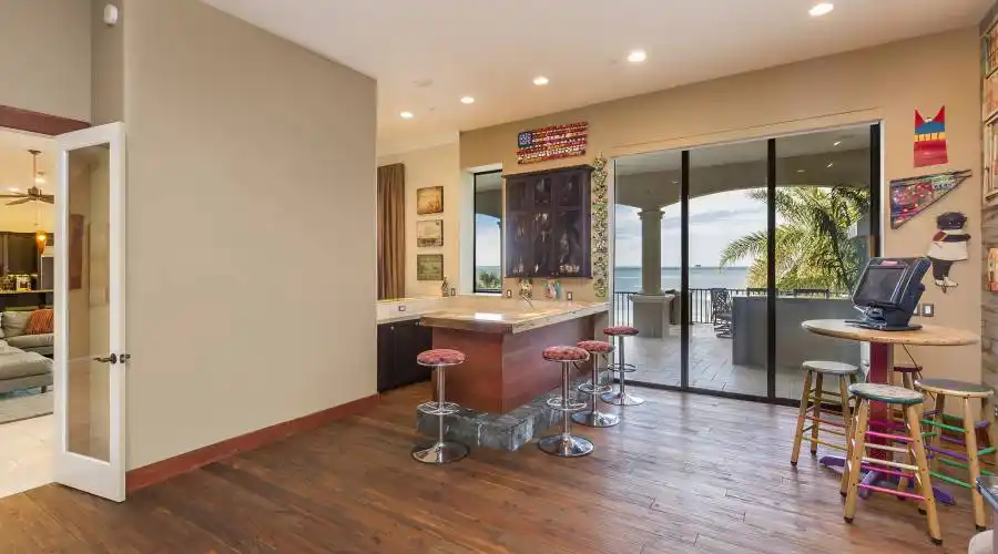 Summer kitchen easily accessed via glass sliders